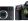 A Fuji mirrorless camera next to a Nikon DSLR.