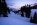 Snowy Landscape with Distant Mountains